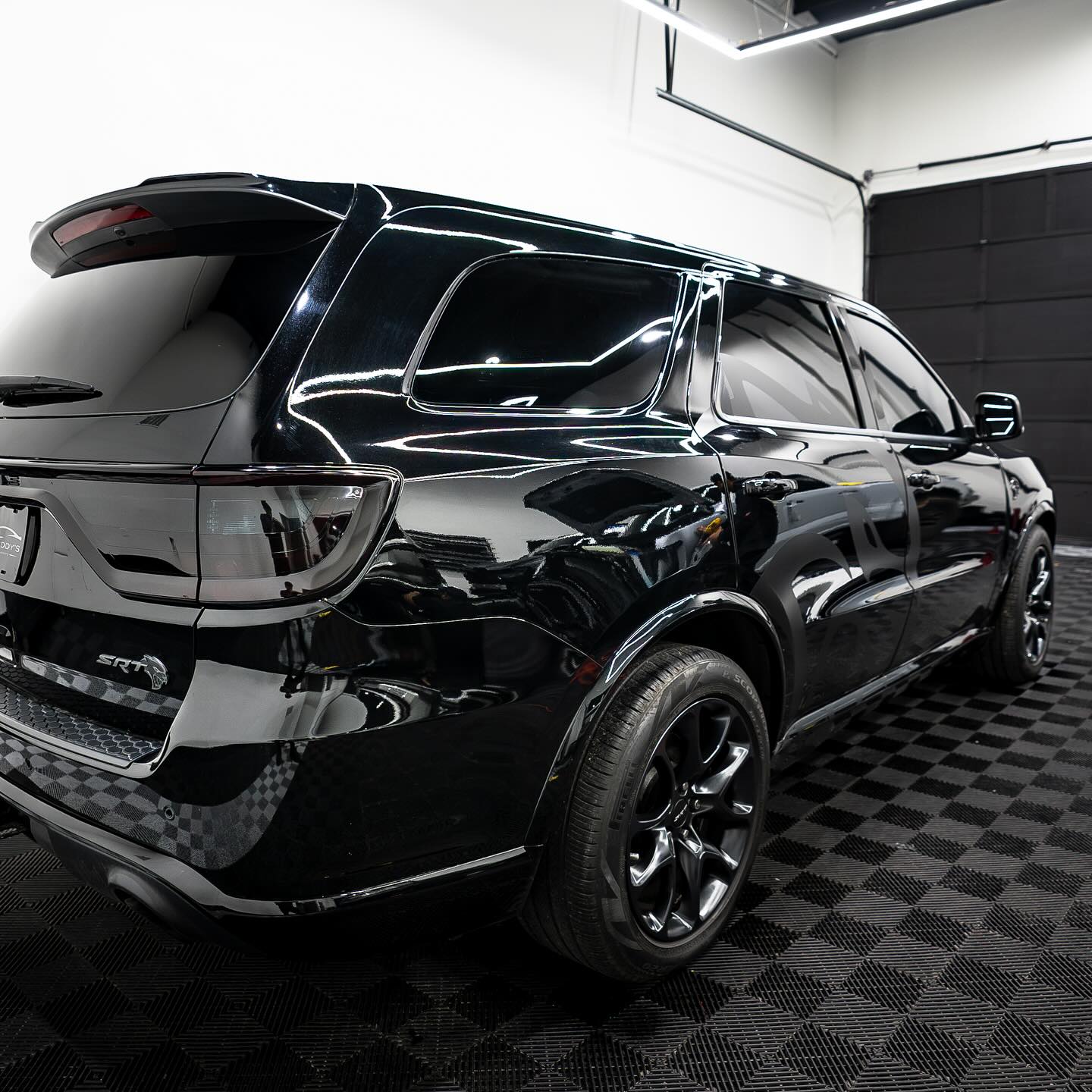 A Dodge Durango Hellcat SRT showcasing a tinting job provided by Wrap Daddy's