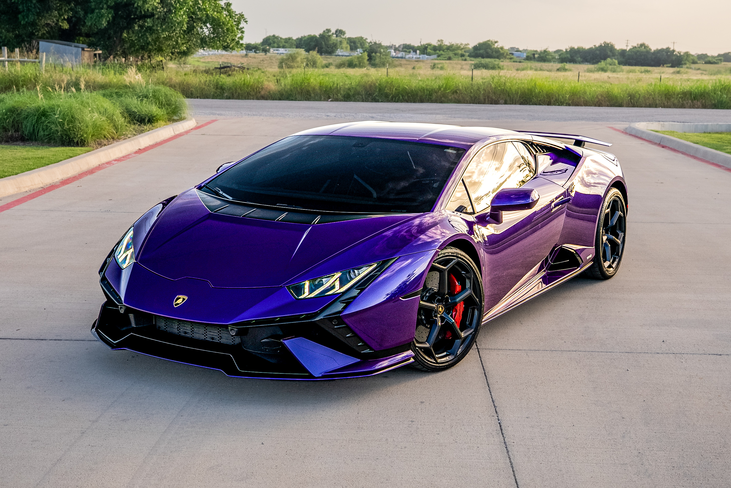 Lamborghini Tecnica in stunning Viola Pasifae, the rarest color Lamborghini has produced, preserved without alteration. Wrapped in full-body XPEL Ultimate Plus PPF installed edge-to-edge, then ceramic coated for added gloss, hydrophobic protection, and longevity. Carbon fiber trim and red calipers left exposed.