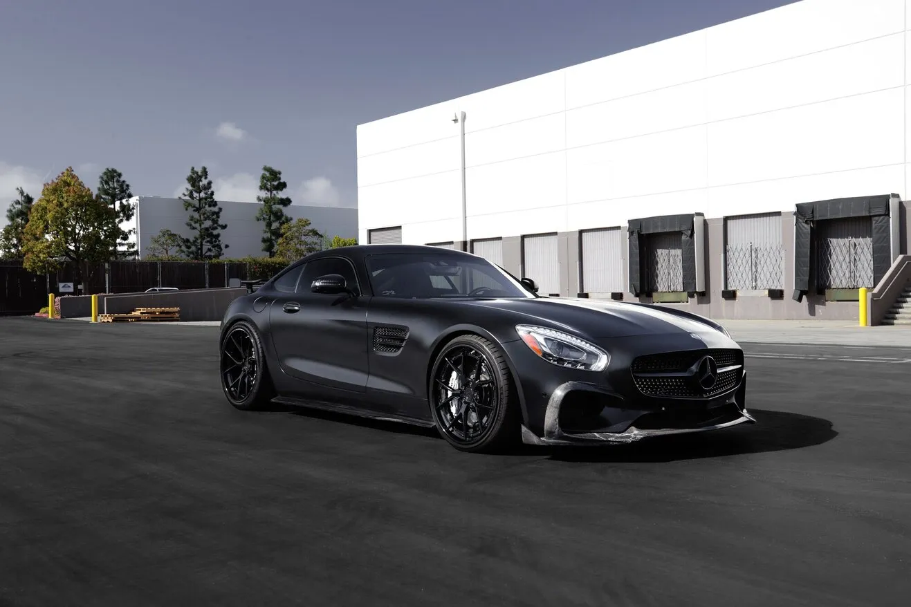 A dark gray Mercedes