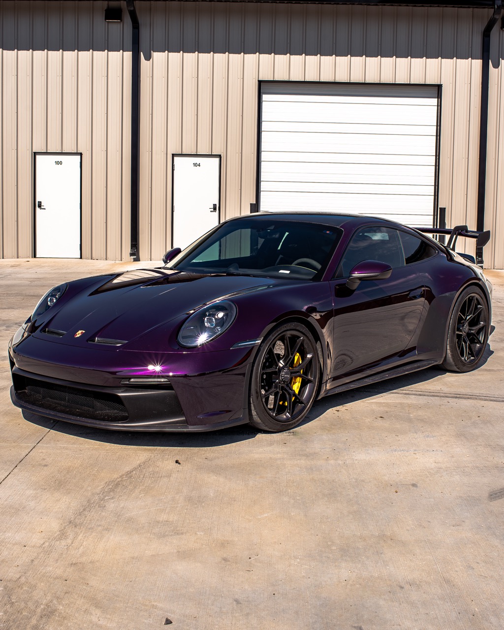 2024 Porsche GT3 wrapped with full-body Gloss Midnight Purple color PPF, delivering a seamless color shift with added impact protection.