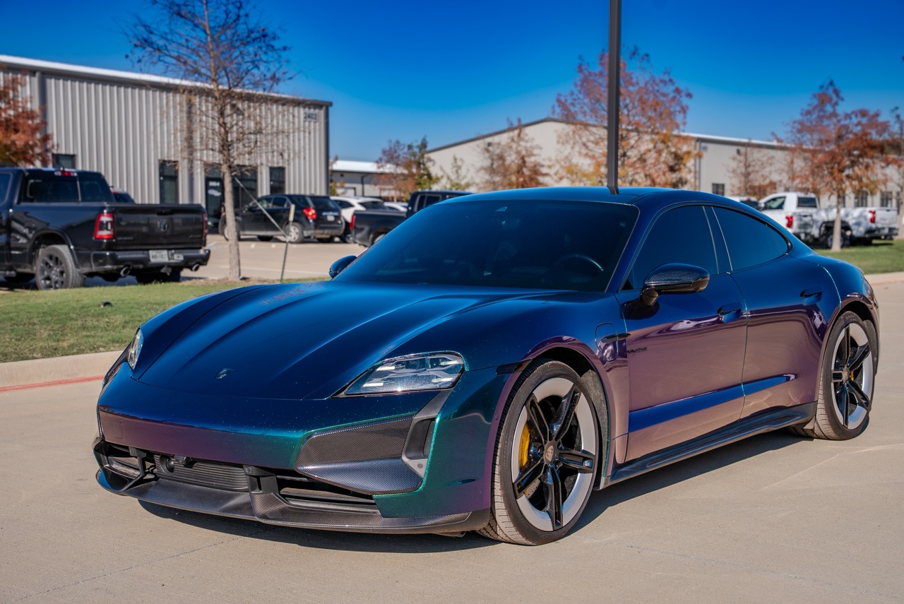 Factory British Green transformed with full-body Neptune Space Blue color-shift PPF, delivering dynamic hue changes with added impact protection. Installed edge-to-edge with seamless execution. Yellow calipers and carbon trim retained for sharp contrast.