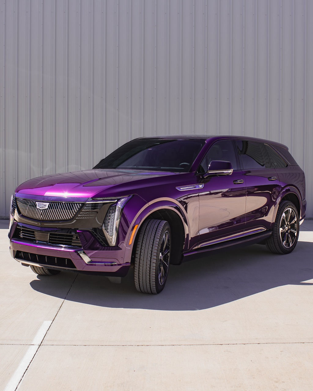 Factory Ebony Metallic converted with full-body Ultra Gloss Pink Purple vinyl wrap, sealed with XPEL clear PPF for long-term protection and durability. Installed edge-to-edge with clean execution. Black trim and window tint retained for contrast and depth.